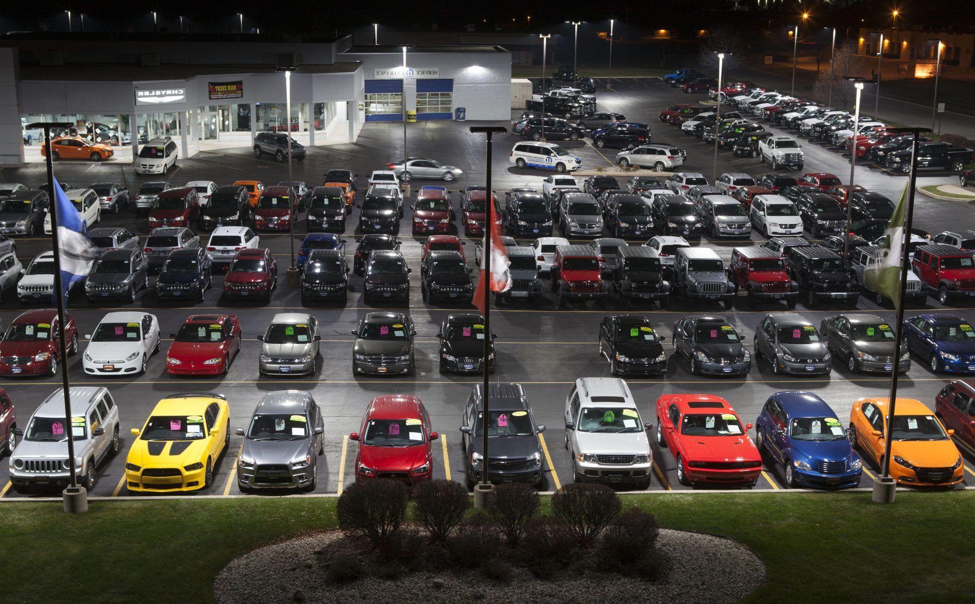 aerial view of cars at a dealership